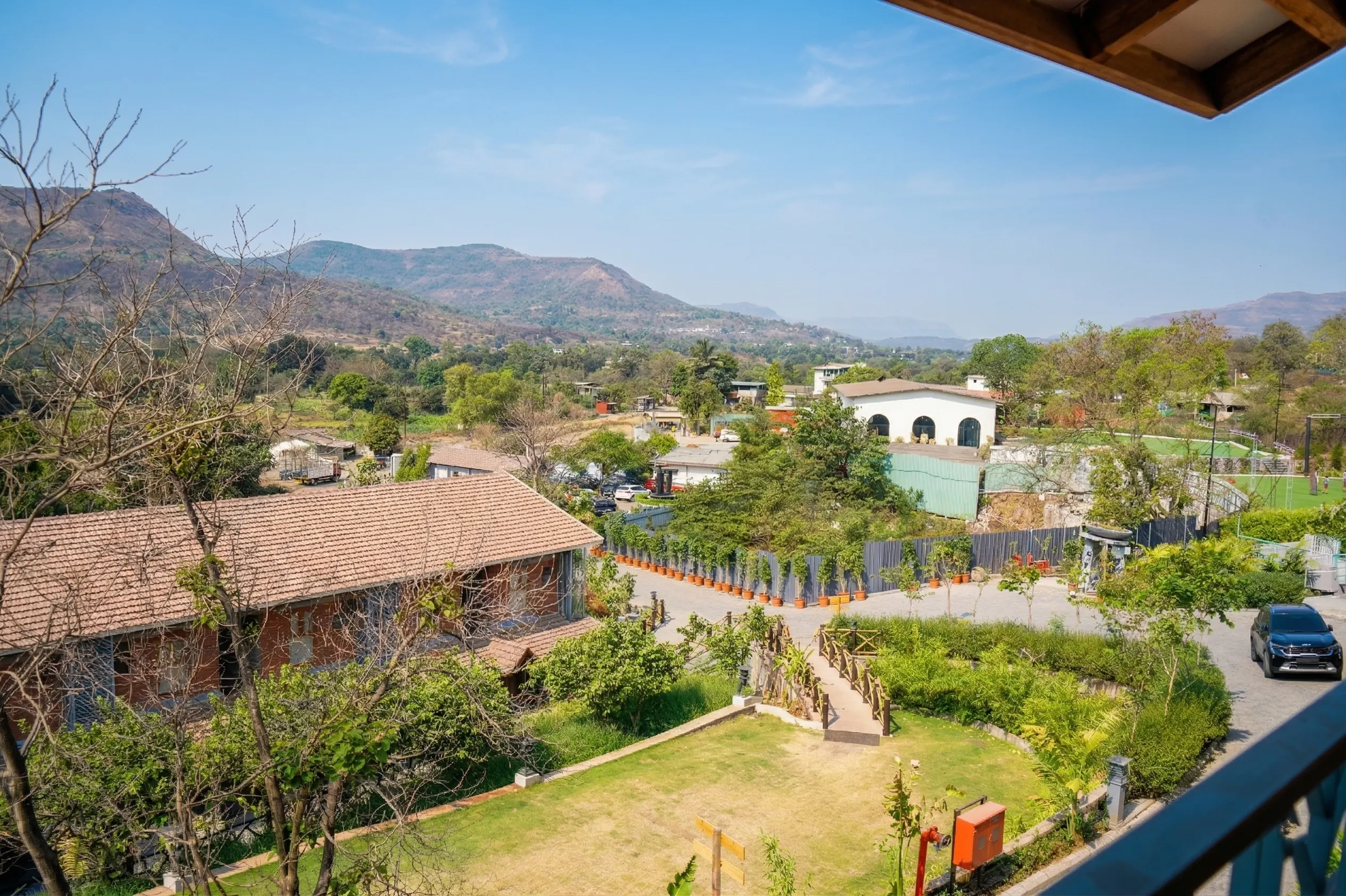 Green Valley resort surrounded by hills and gardens